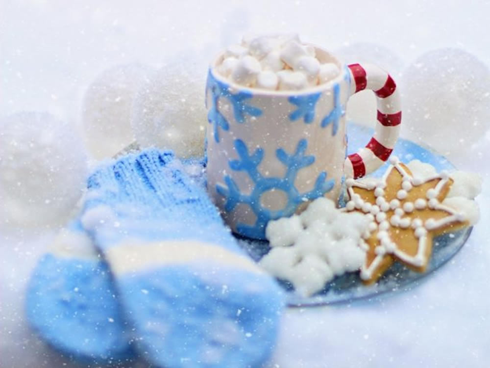 Cocoa and cookies and mittens are seasonal greetings from SageVest Wealth Management
