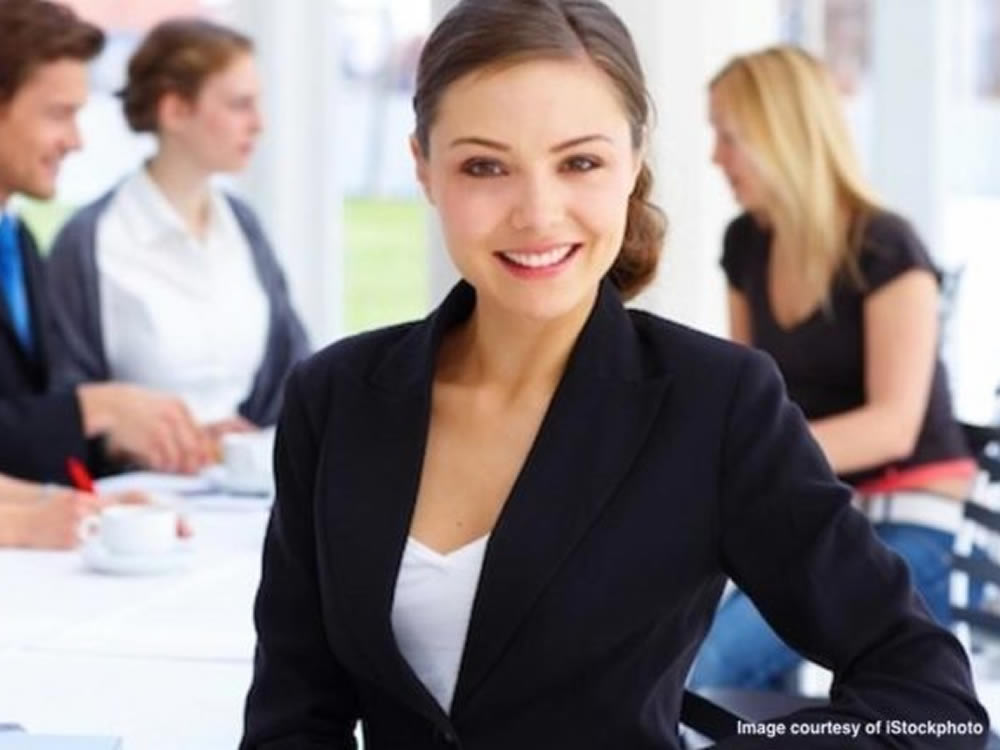 Young business professional understands the importance of relationship tips for working women