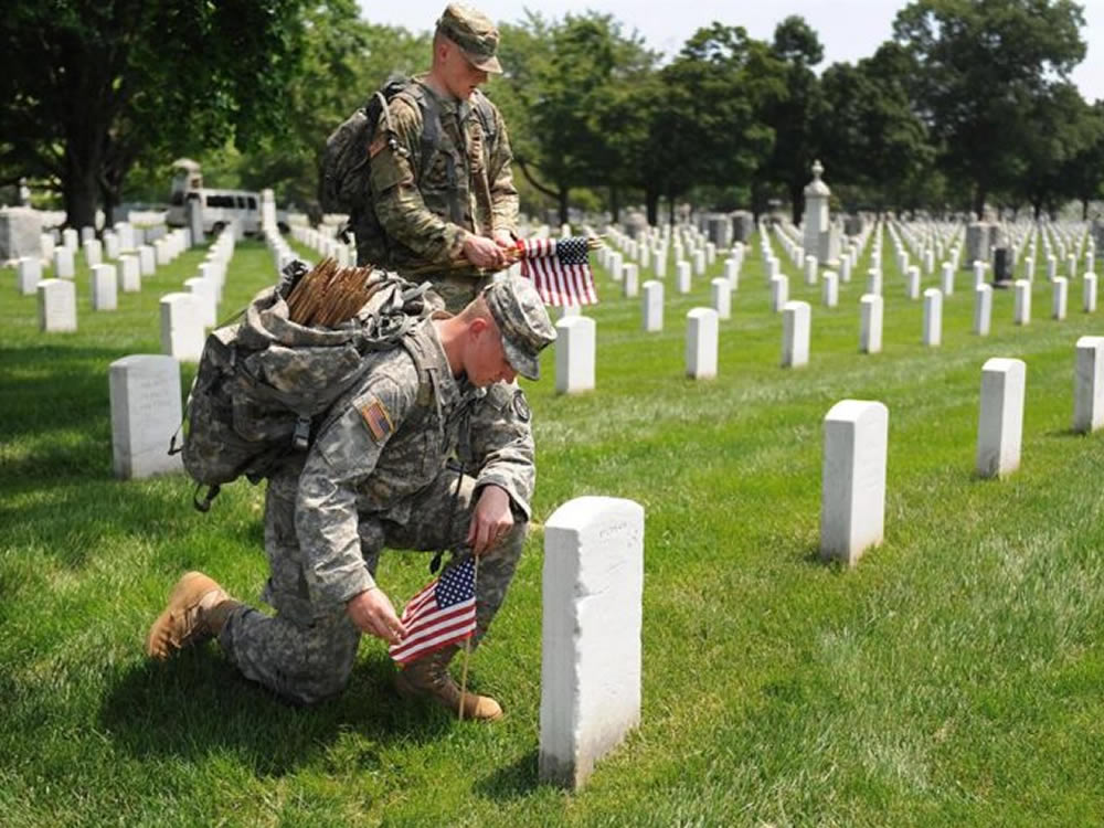 Post-9/11 GI solders setting flags at Arlington National Cemetery