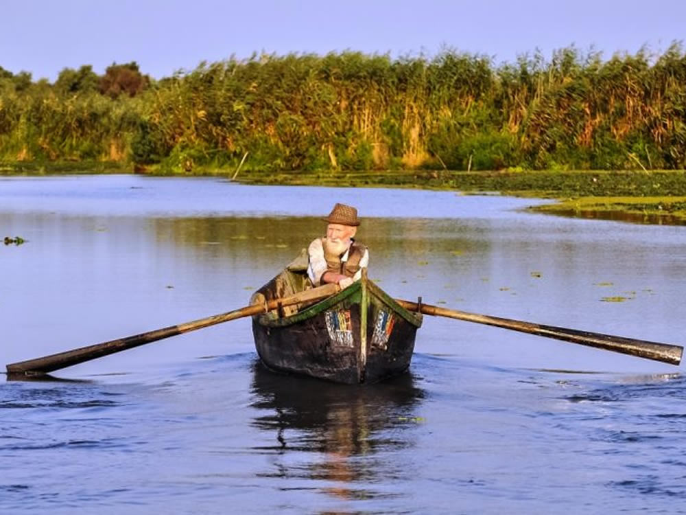 Man fishing because he has the time after retiring part-time