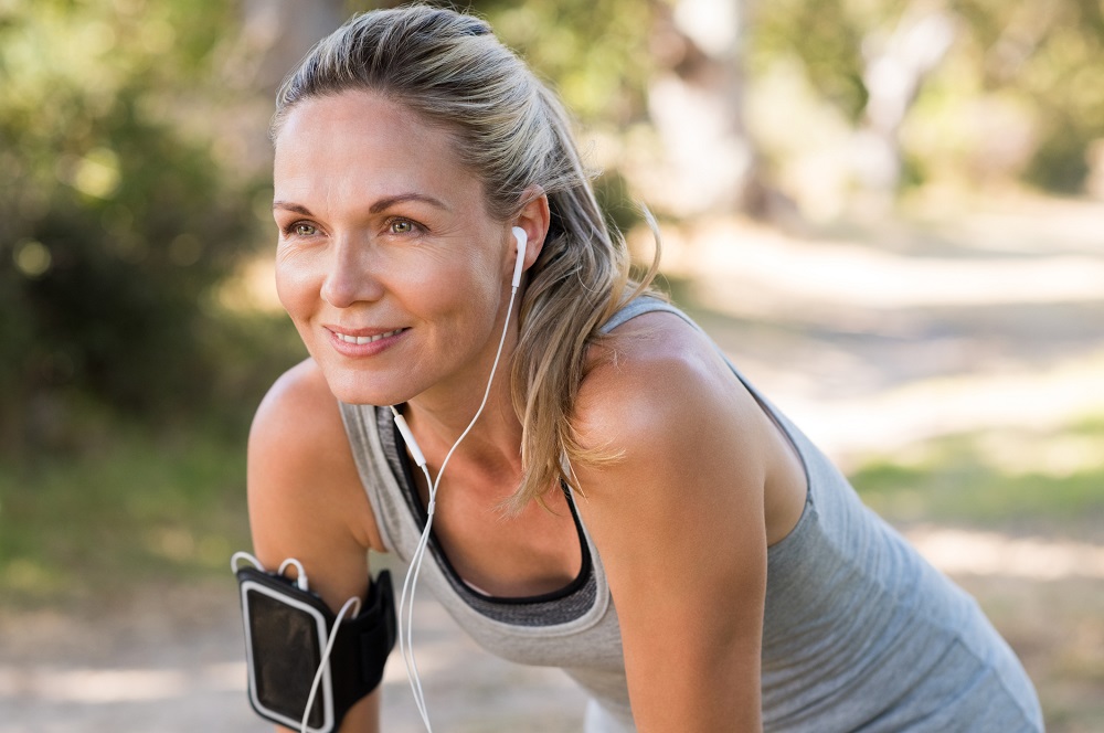 Woman jogger considering the future and the countdown to retirement