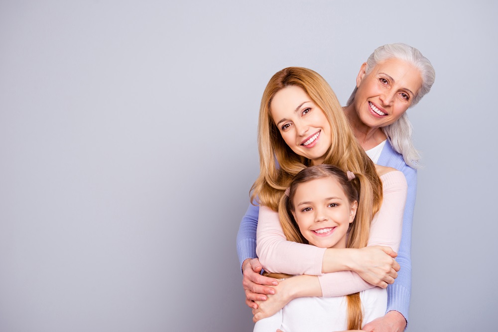 Three generations of women, representing the Sandwich Generation